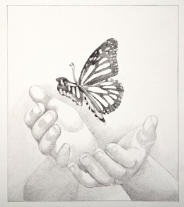 imagen de unas manos y una mariposa